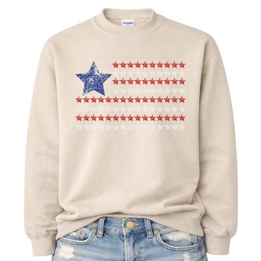 Beige sweatshirt with a blue star and red stars american flag pattern on a white background