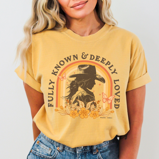Fully known and deeply loved Christian cowgirl silhouette graphic on yellow shirt