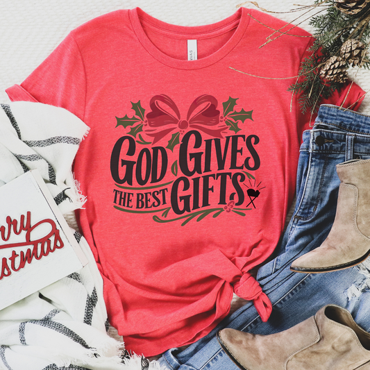 Red t-shirt with 'God Gives the Best Gifts' text, surrounded by a big red bow and green holly.
