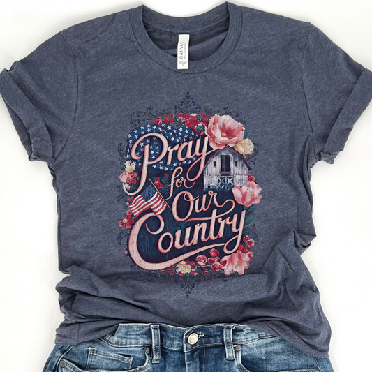 Navy blue t-shirt with 'Pray for Our Country' graphic design on a white background