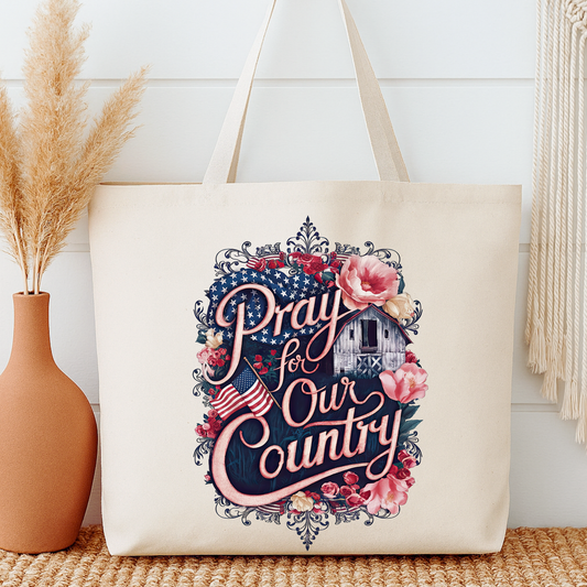 Tote bag with 'Pray for Our Country' design on a neutral background