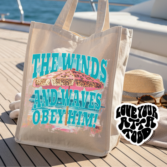 Jumbo tote bag the features a pink leopard print beach umbrella that says The winds and waves obey him