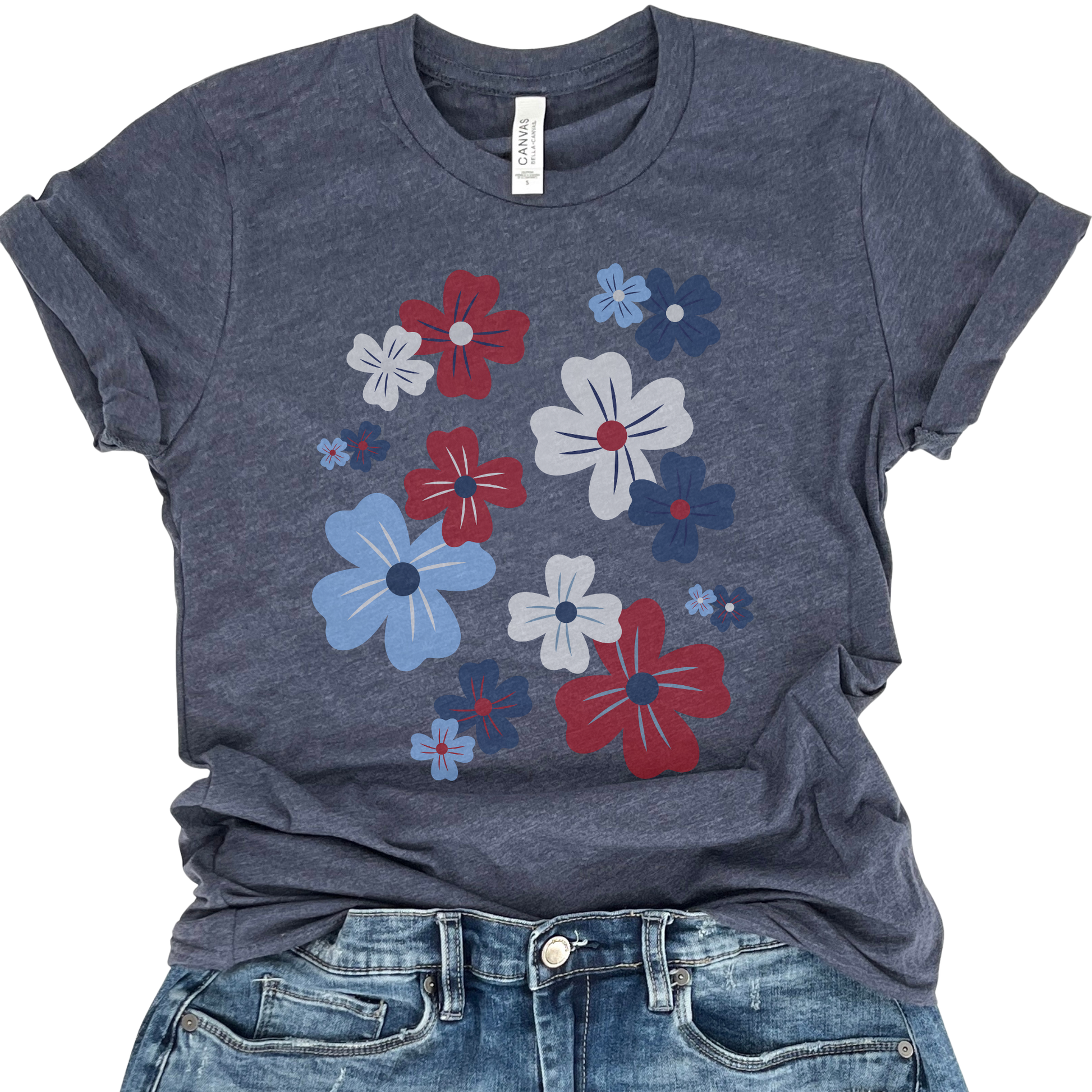 A red, white, and blue graphic t-shirt with a floral pattern, displayed on a navy background.