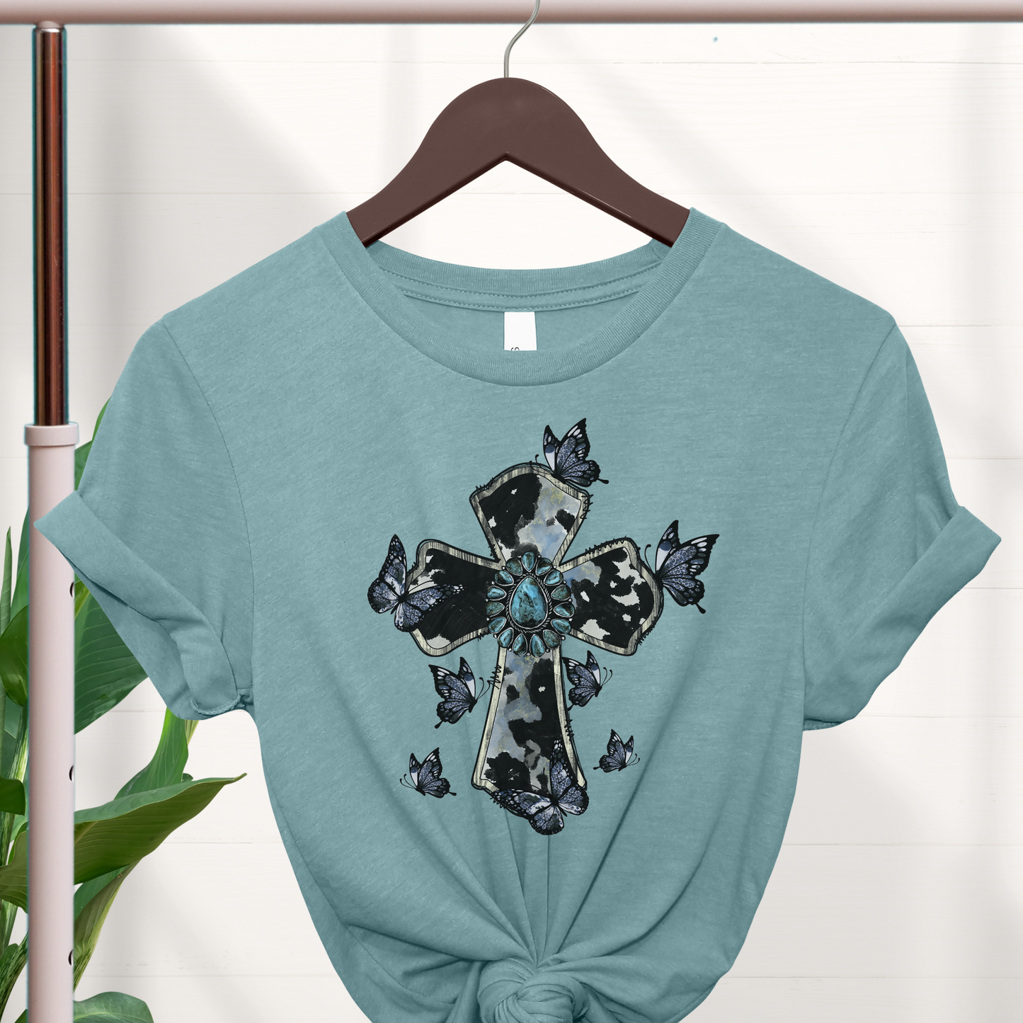 Turquoise cross with butterfies tee