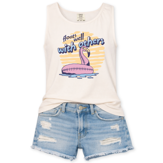 ivory tank top with a flamingo floaty graphic design that says floats well with others.