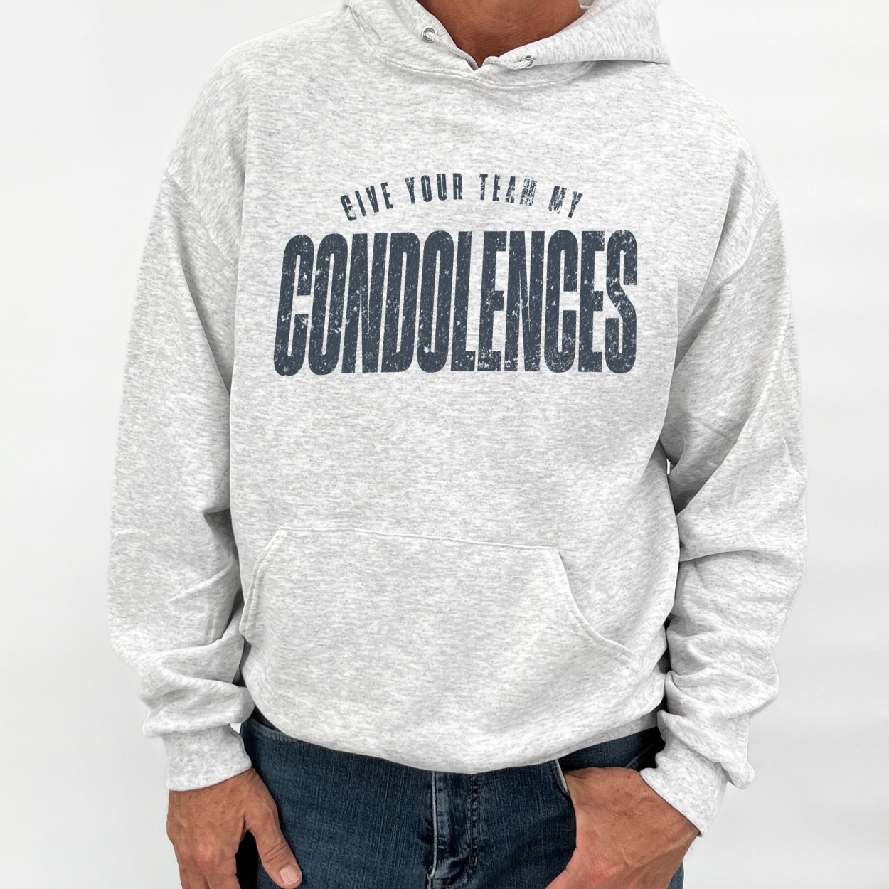 Gray hoodie with text 'Give your team my condolences' on a white background