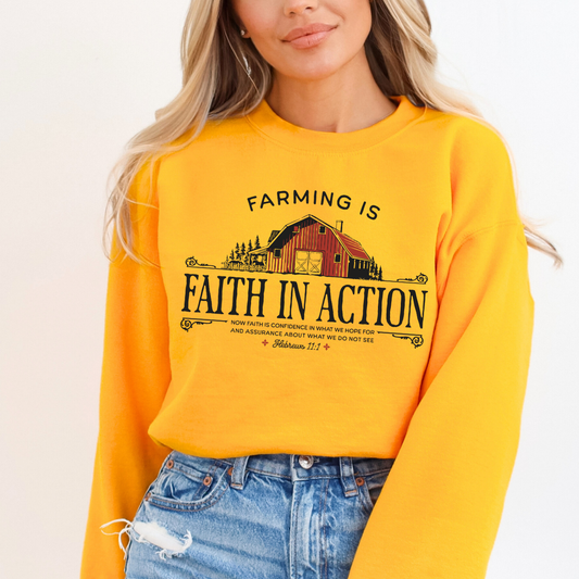 Farming is Faith in Action Hebrews 11:1.  Picture of a red barn on a gold sweatshirt