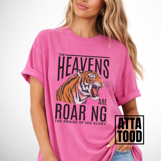 The heavens are roaring the praise of His glory tiger graphic on a comfort colors pink tee