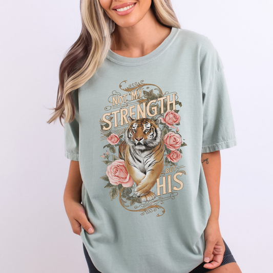 Not my strength but his graphic sage green graphic t-shirt with a large tiger and pink roses