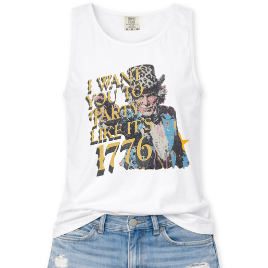 white Comfort Colors tank top featuring a distressed vintage Uncle Sam graphic with the phrase “I Want You To Party Like It’s 1776” in layered gold and dark lettering, styled in a flat lay mockup with light wash denim jeans.