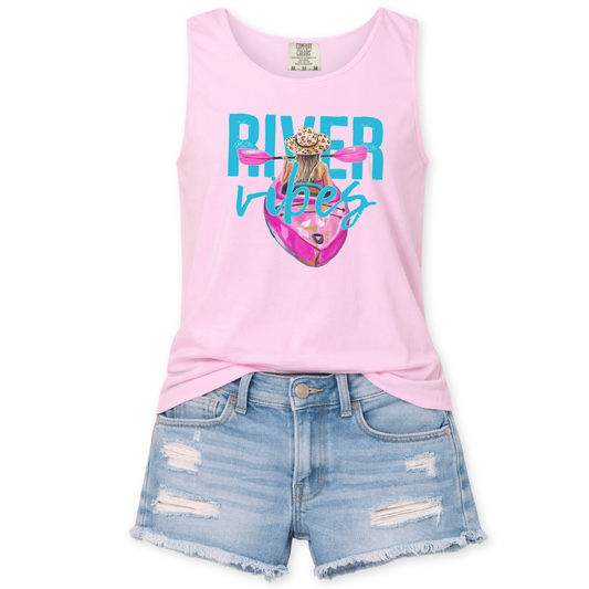 Pink tank top with 'River Ripes' graphic and denim shorts on a white background
