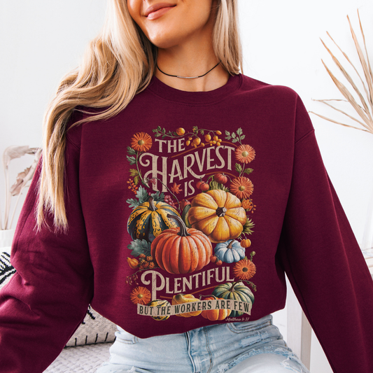The harvest is plentiful, but the workers are few Matthew 9:37 maroon sweatshirt.  Features big and small different fall color fall pumpkins