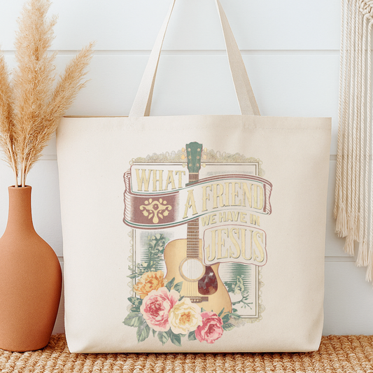 Tote bag with guitar and floral design on a neutral background.  What a friend we have in Jesus
