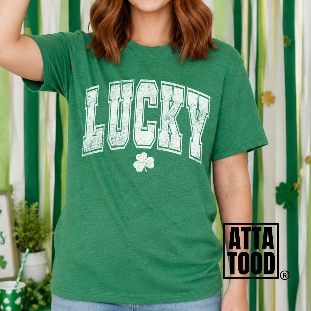 COLLECTION PHOTO OF A WOMAN WEARING A GREEN TSHIRT THAT SAYS LUCKY FOR ST. PATTY'S DAY