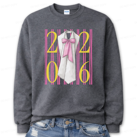 Graduation 2026 graphic on a classic crewneck sweatshirt. The design features bold 2026 numerals layered over vertical pink stripe accents, centered with a detailed sash illustration finished with an oversized pink bow. The feminine bow detail combined with strong year callout creates a standout Class of 2026 statement that works for both high school seniors and college graduates.