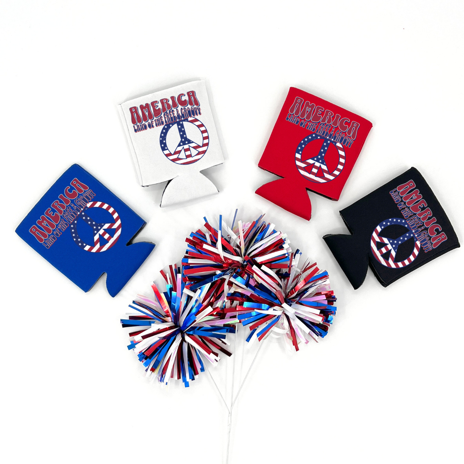 Red, Blue, Black and White collapsible can cooler displayed on a white background with a red, white, and blue metallic pom pom in the foreground. The graphic features retro lettering that reads “America Land of the Free & Groovy” above a peace sign filled with an American flag pattern. Patriotic red, white, and blue graphic printed on the front of the drink sleeve style can cooler.
