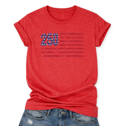 Heather red Bella Canvas t-shirt mockup with rolled sleeves and a front tuck into distressed denim, featuring a small “250” with stars and distressed red flag stripes graphic across the chest.