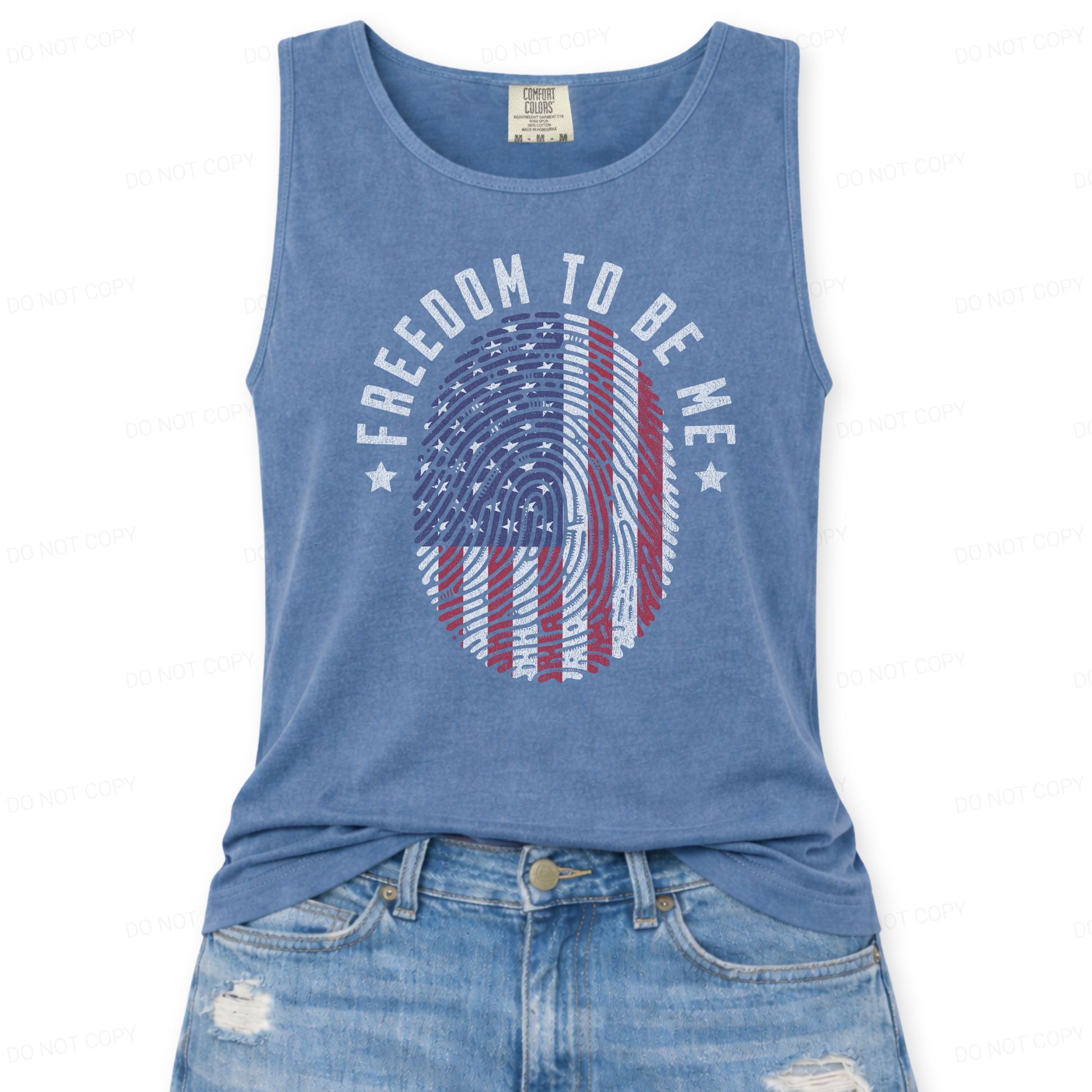 Blue tank top with American flag design and 'Freedom To Be Me' text on a white background