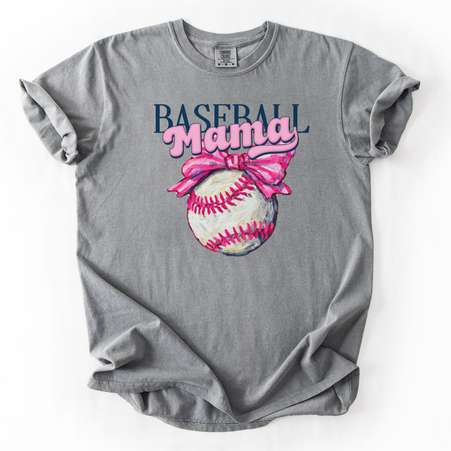 Blue t-shirt with 'Baseball Mama' graphic featuring a baseball and pink bow on a white background