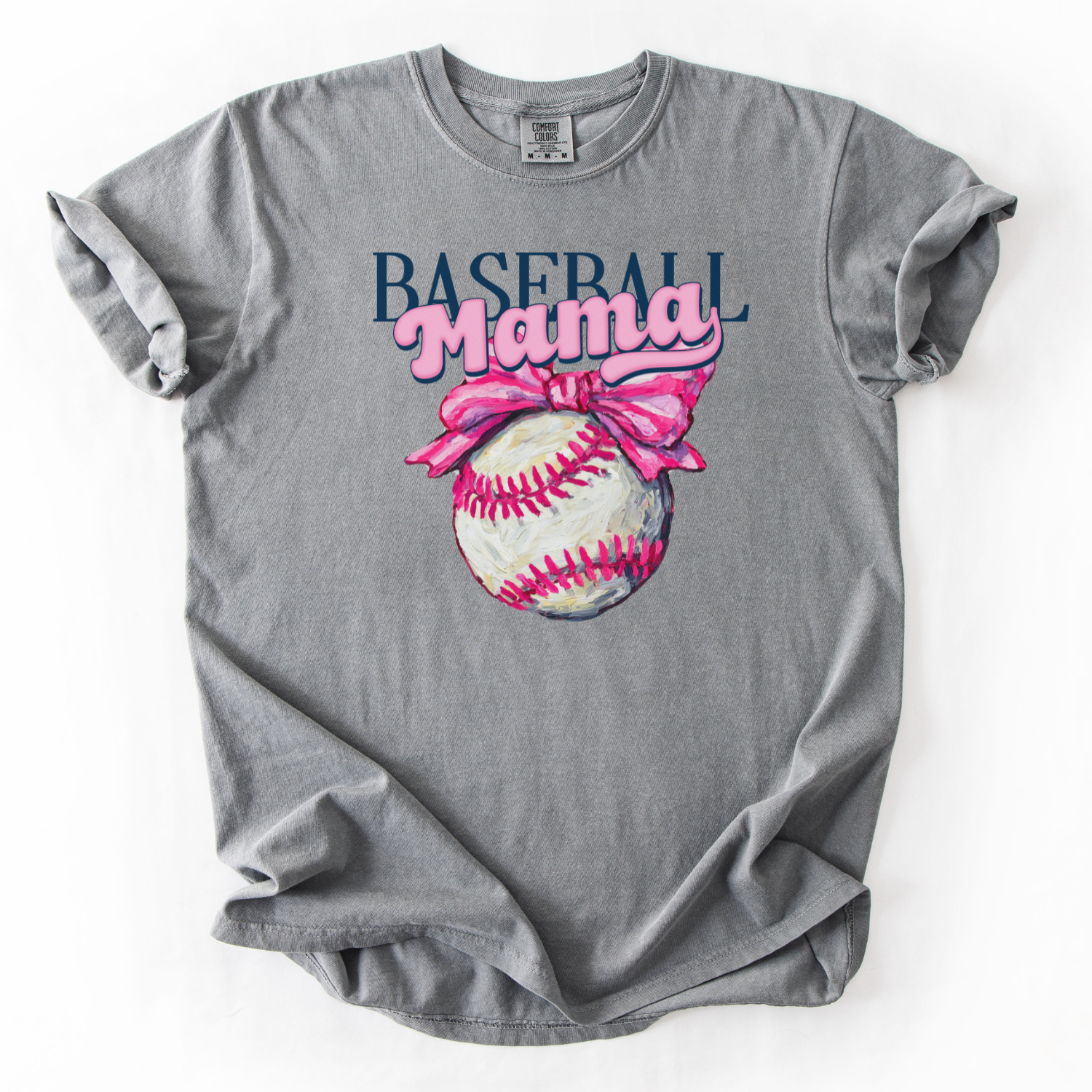 Blue t-shirt with 'Baseball Mama' graphic featuring a baseball and pink bow on a white background