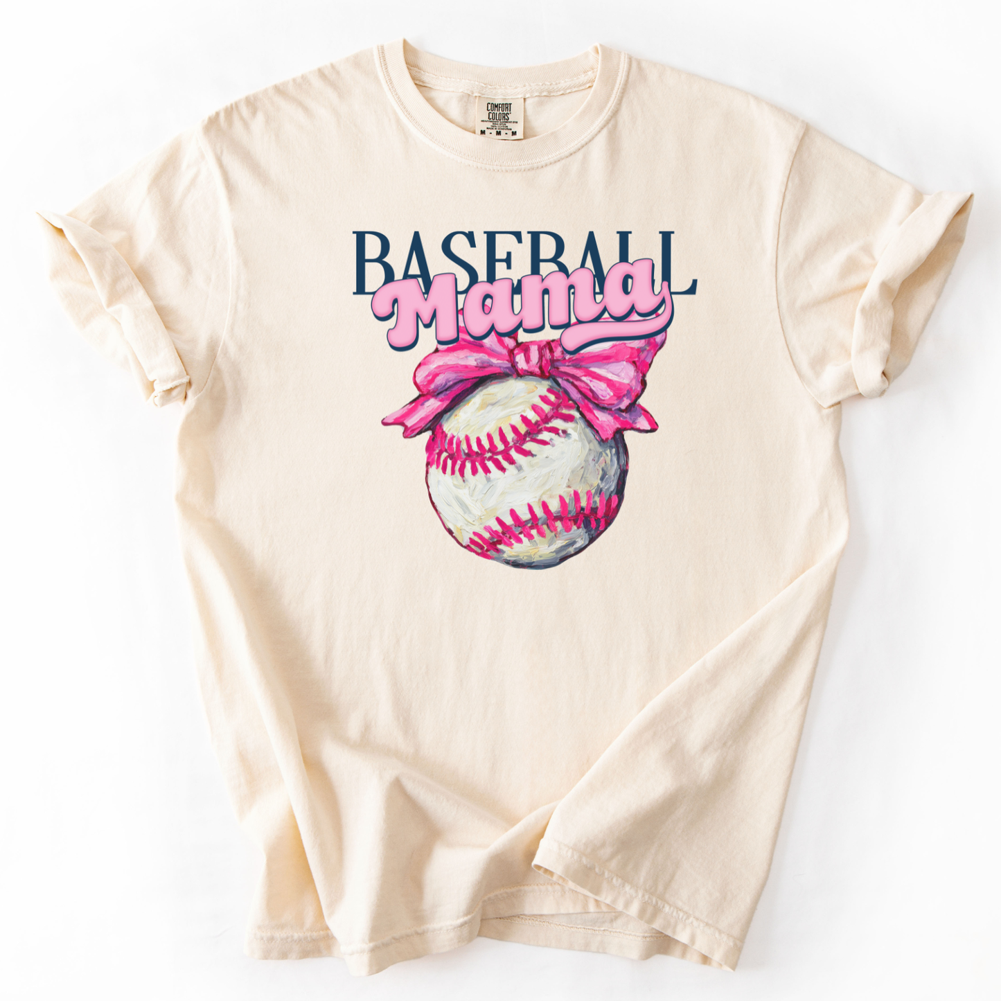Blue t-shirt with 'Baseball Mama' graphic featuring a baseball and pink bow on a white background