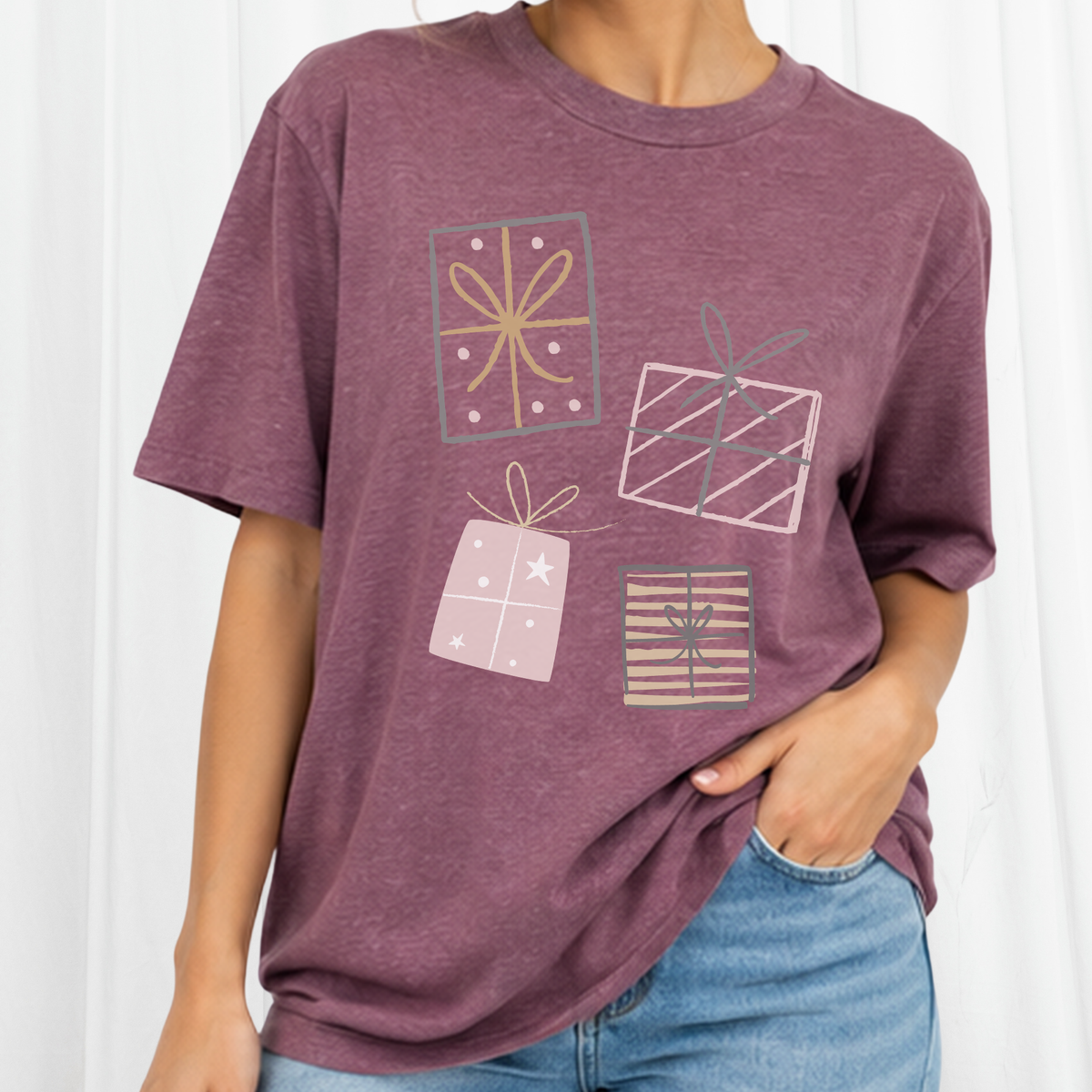 Christmas Gift boxes staggered on a Maroon Tee