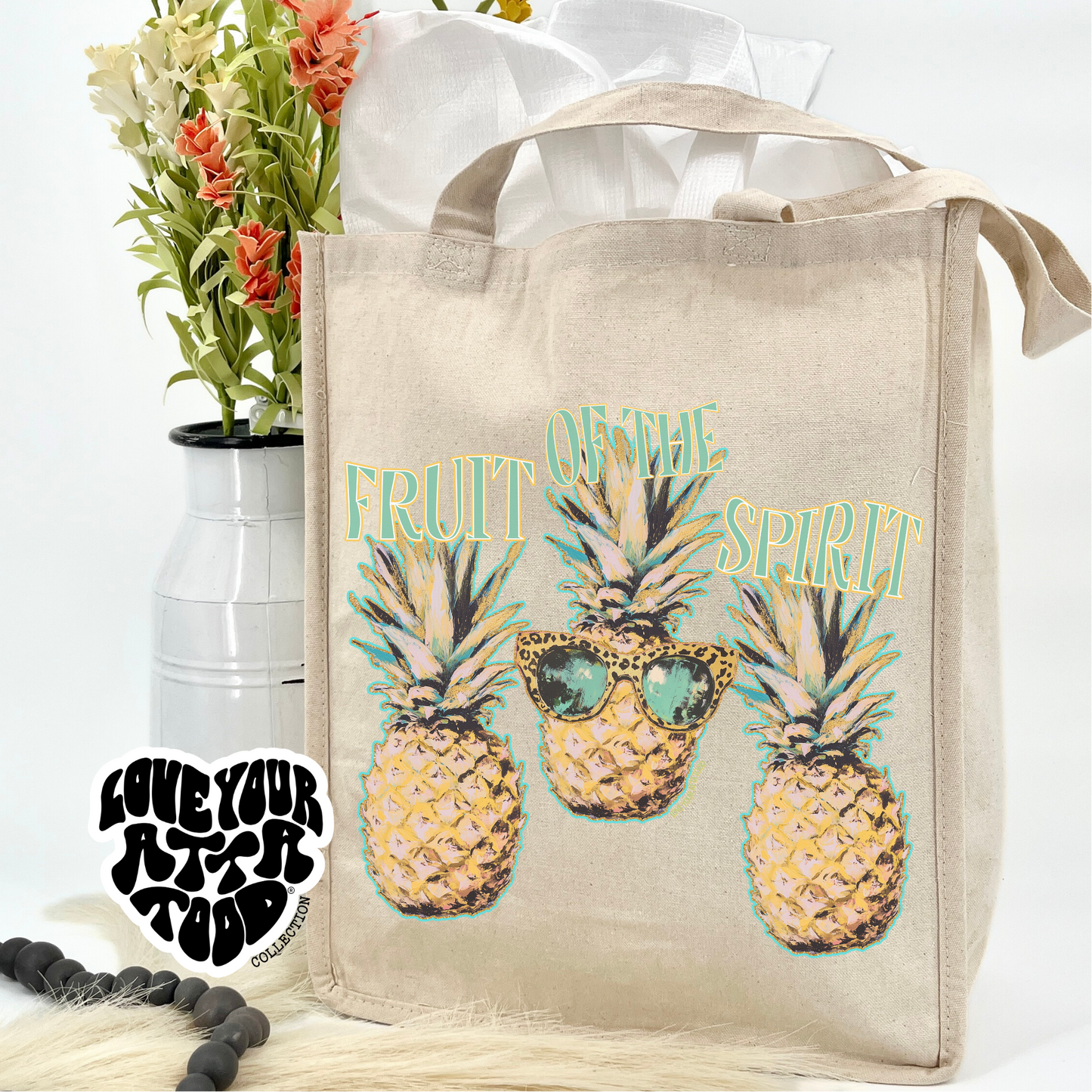 Fruit of the spirit jumbo canvas tote bag featuring 3 colorful pineapples wearing sunglasses