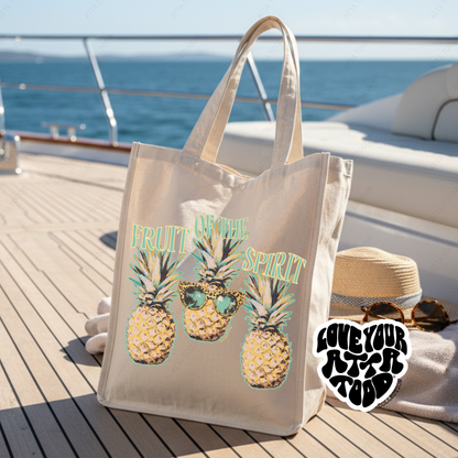 Tote bag with pineapple design and sunglasses on a boat deck.  Fruit of the spirit