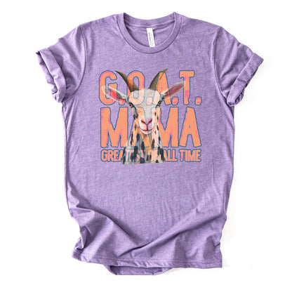 heather purple "G.O.A.T Greatest of All Time Mama" Featuring a goat graphic tee on a premium soft Bella Canvas Unisex tee.&nbsp;