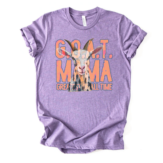 heather purple "G.O.A.T Greatest of All Time Mama" Featuring a goat graphic tee on a premium soft Bella Canvas Unisex tee.&nbsp;