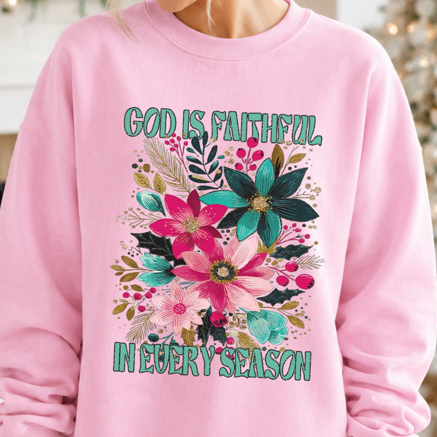 God Is Faithful in Every Season Christmas Poinsettias Graphic on a light pink Sweatshirt