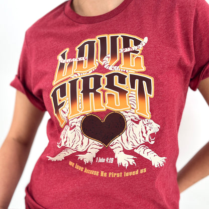 Love First in Bold letters with two tigers.  Biblical verse 1 John 4:19 Christian heather red t-shirt