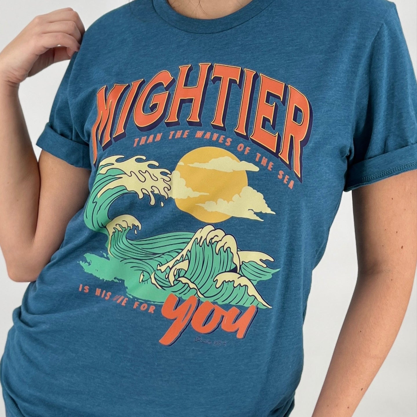 Mightier than the waves Christian unisex graphic t-shirt