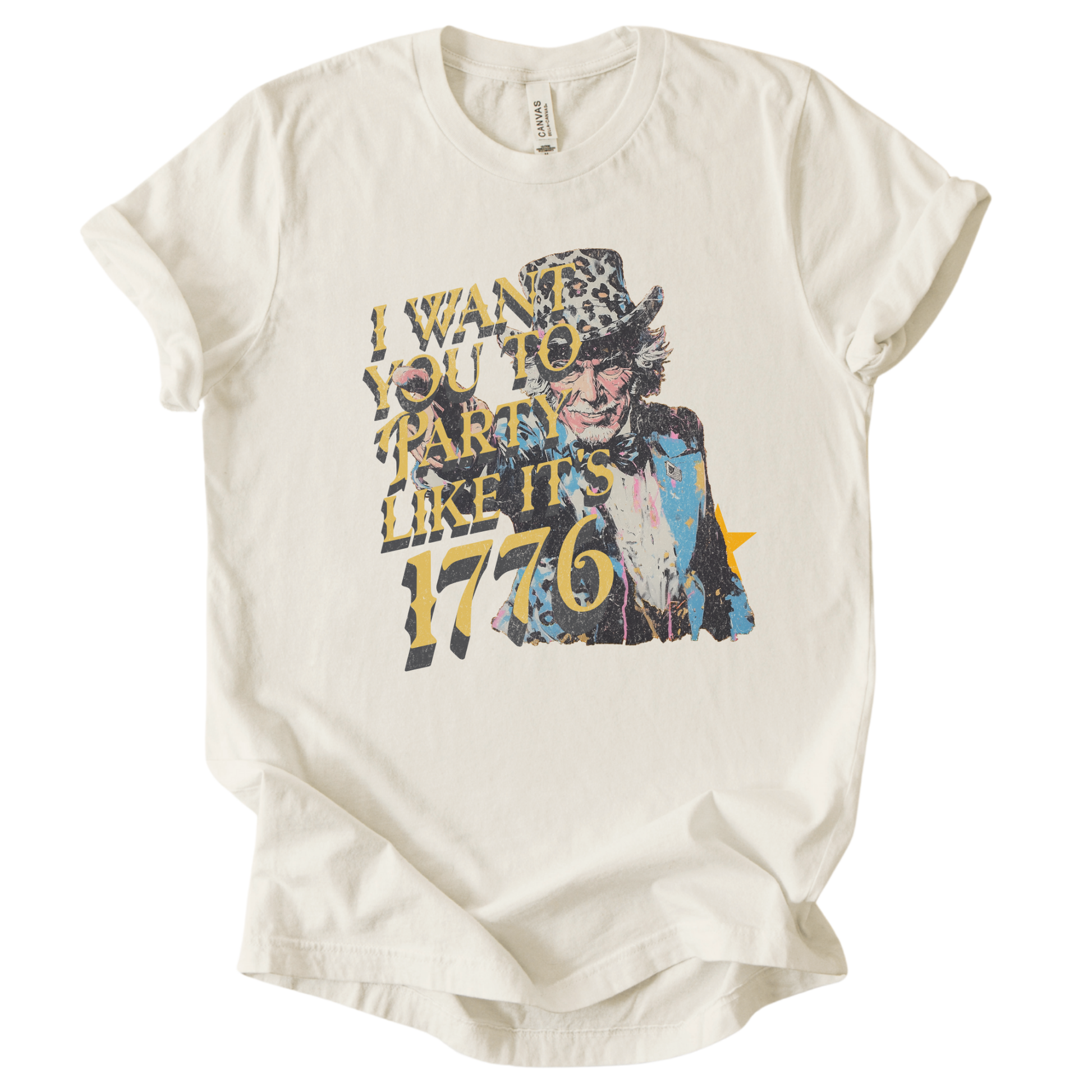 Vintage patriotic 1776 graphic on a cream t-shirt. The design features an illustrated Uncle Sam portrait with distressed textures and bold gold lettering reading “I Want You to Party Like It’s 1776.” The artwork blends Revolutionary War imagery with modern, playful Fourth of July messaging, creating a nostalgic Americana look ideal for Independence Day and summer patriotic collections.