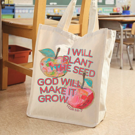 Jumbo canvas tote bag with apple-themed teacher graphic and “I Will Plant the Seed God Will Make It Grow” faith message, high-contrast painted-look artwork, Love your ATTA TOOD® brand mark, printed on both sides.