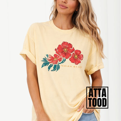 Woman wearing a yellow t-shirt with red floral design and text on a plain background. Isaiah 41:10 Red Poppy Flowers Graphic Comfort Colors Tee