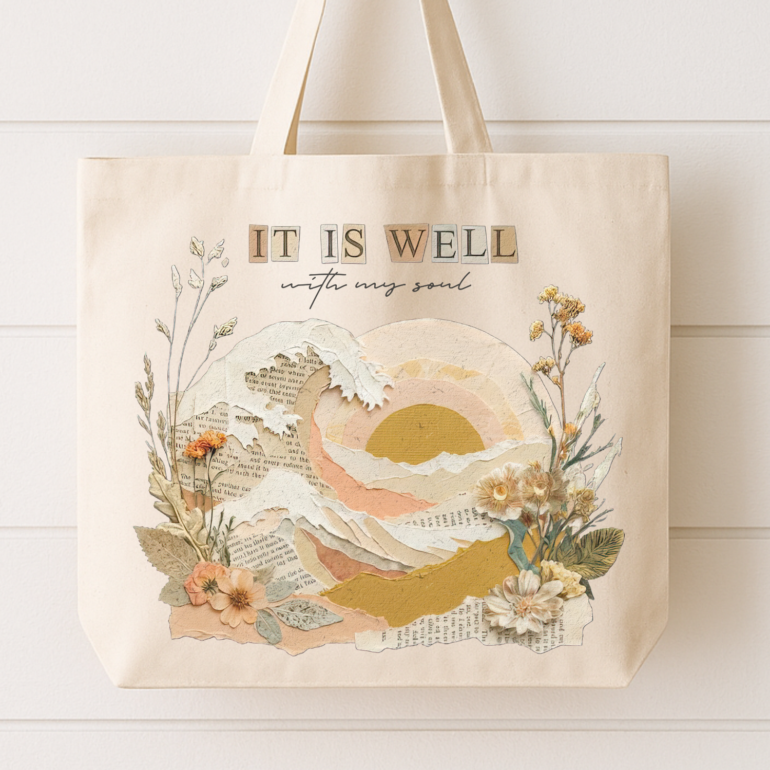 Tote bag with 'It is well with my soul' design featuring a sunset and floral elements on a white background.
