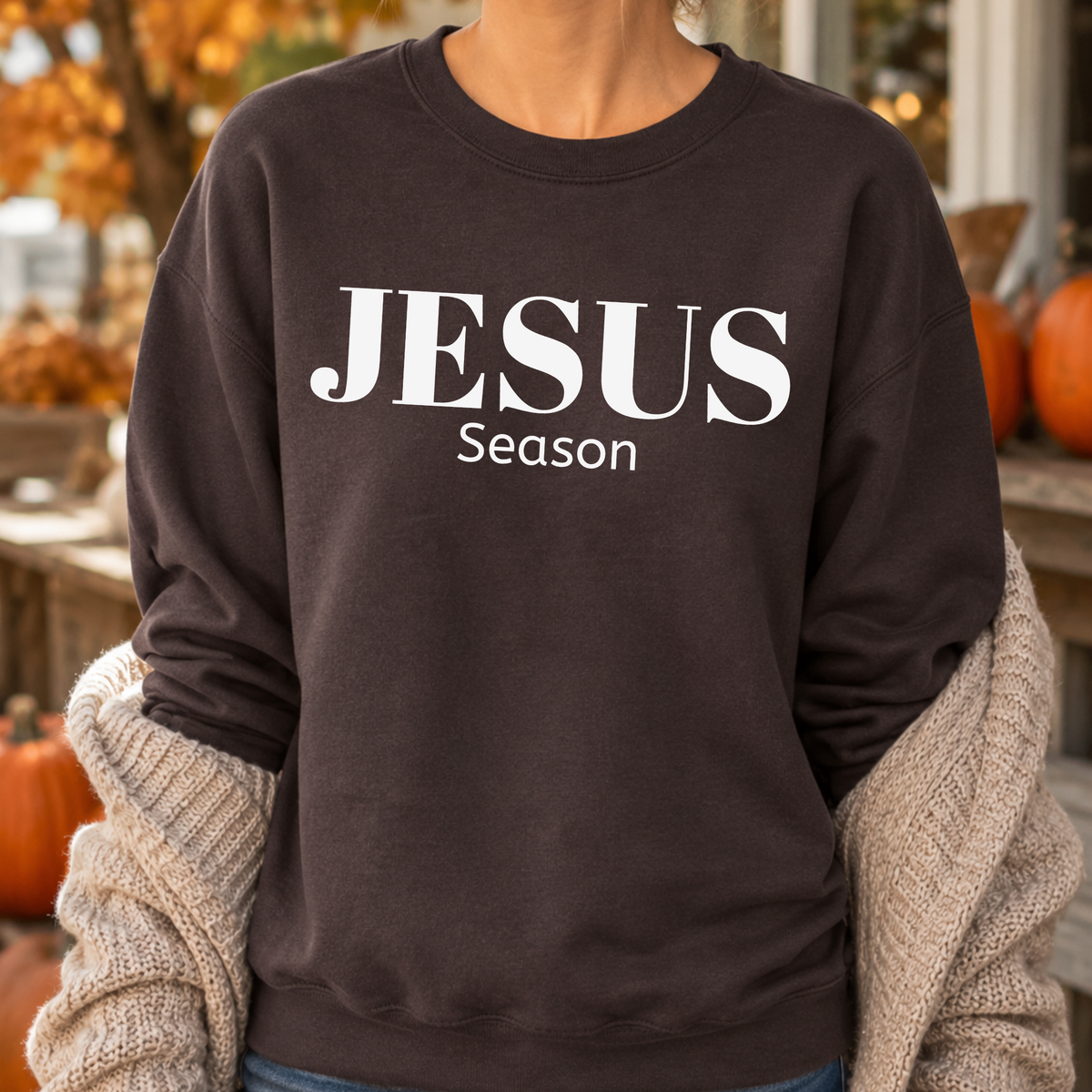 White jesus season on a brown sweatshirt