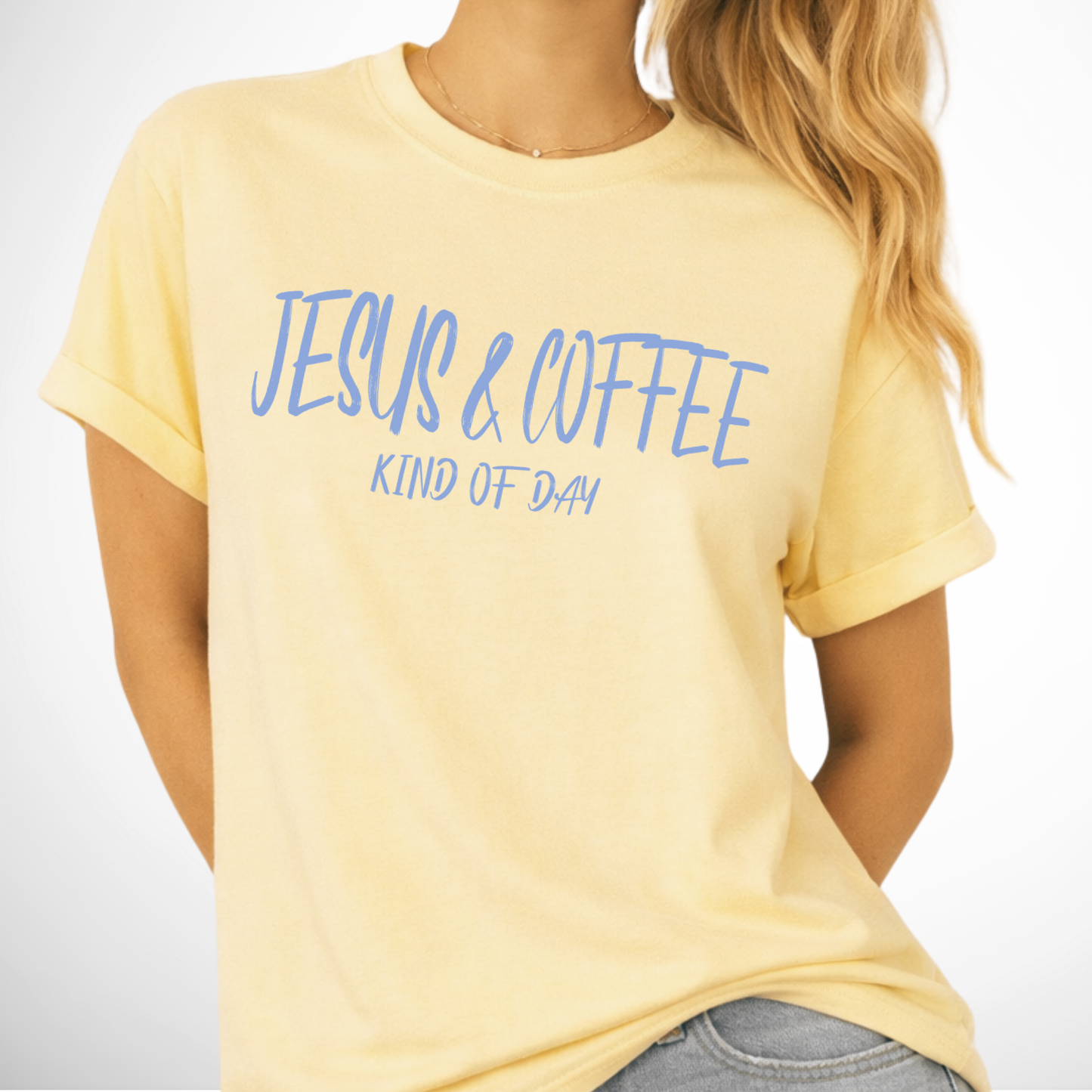 Yellow t-shirt with 'Jesus & Coffee Kind of Day' text on a plain background