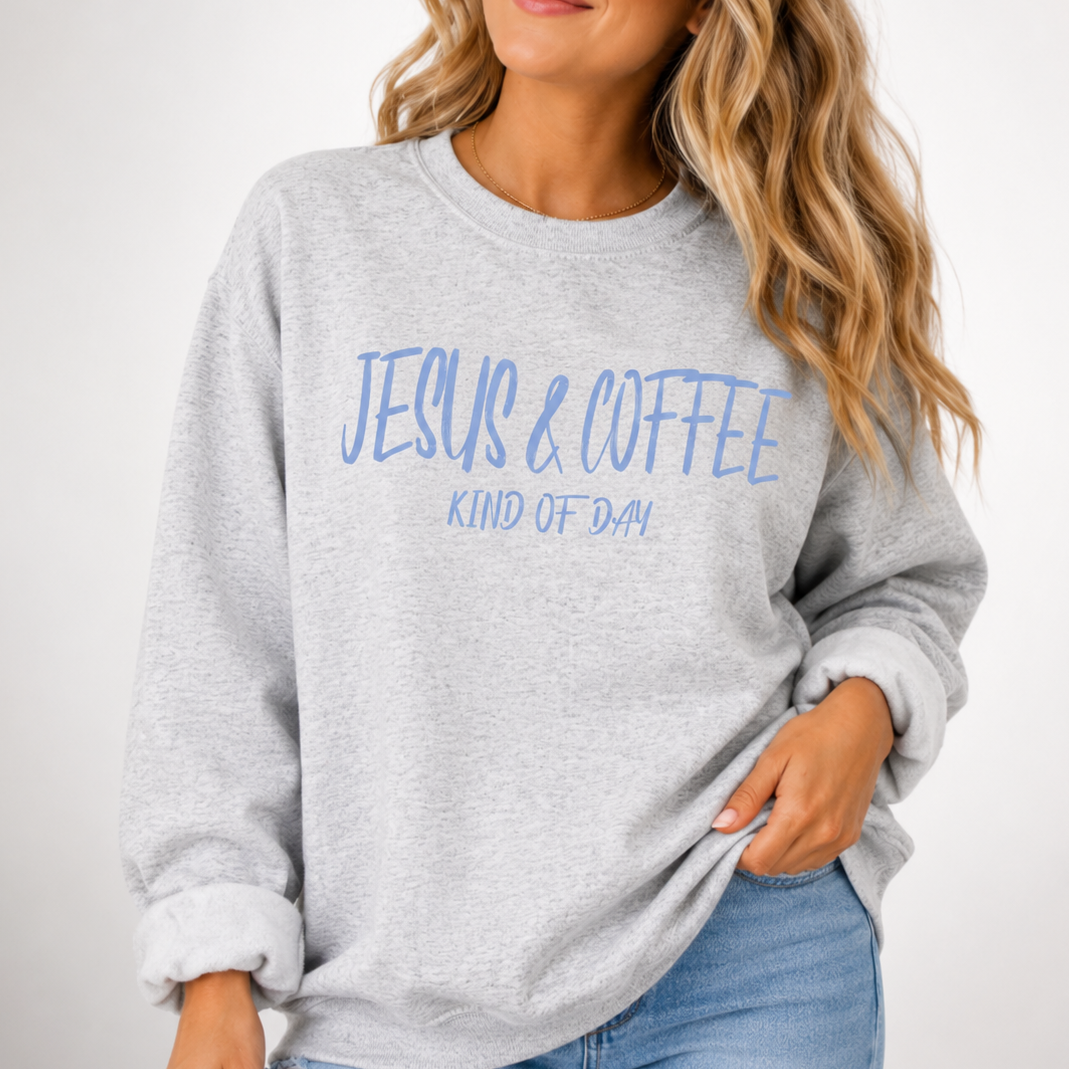 Woman wearing a gray sweatshirt with 'Jesus & Coffee Kind of Day' text on a white background