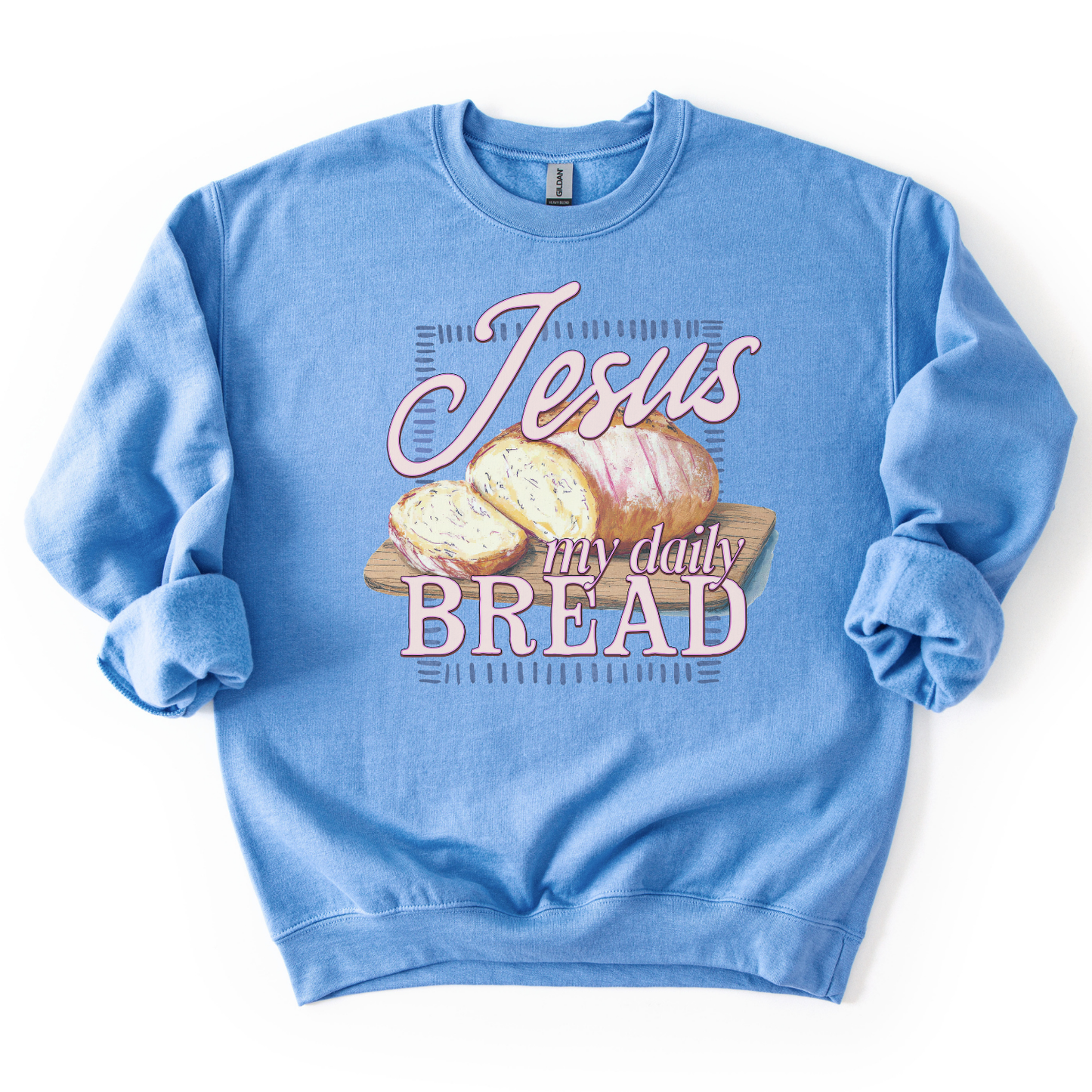 Blue sweatshirt with 'Jesus my daily BREAD' text and bread graphic on a white background