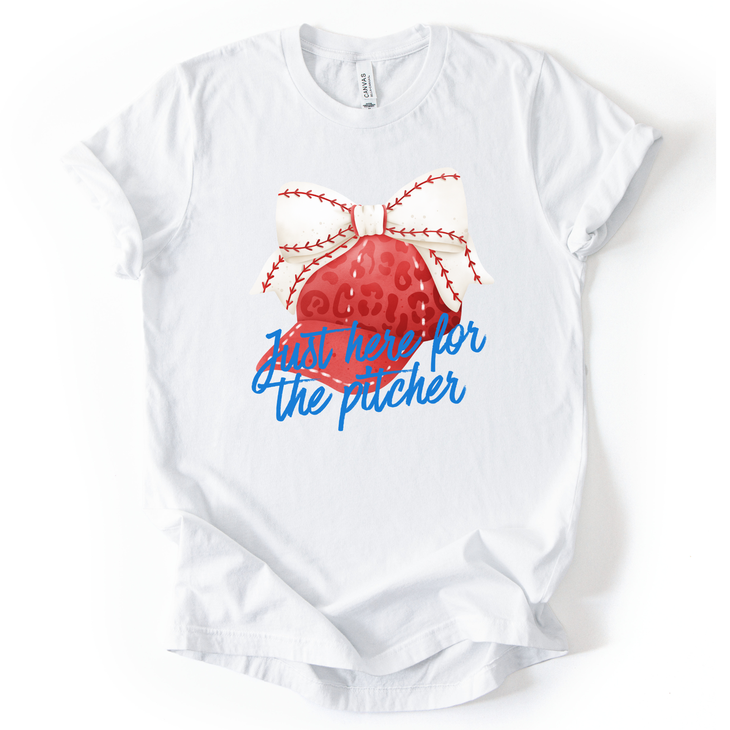 White t-shirt with a red baseball and blue text on a white background. Just here for the pitcher.  a white baseball ribbon is on the red hat