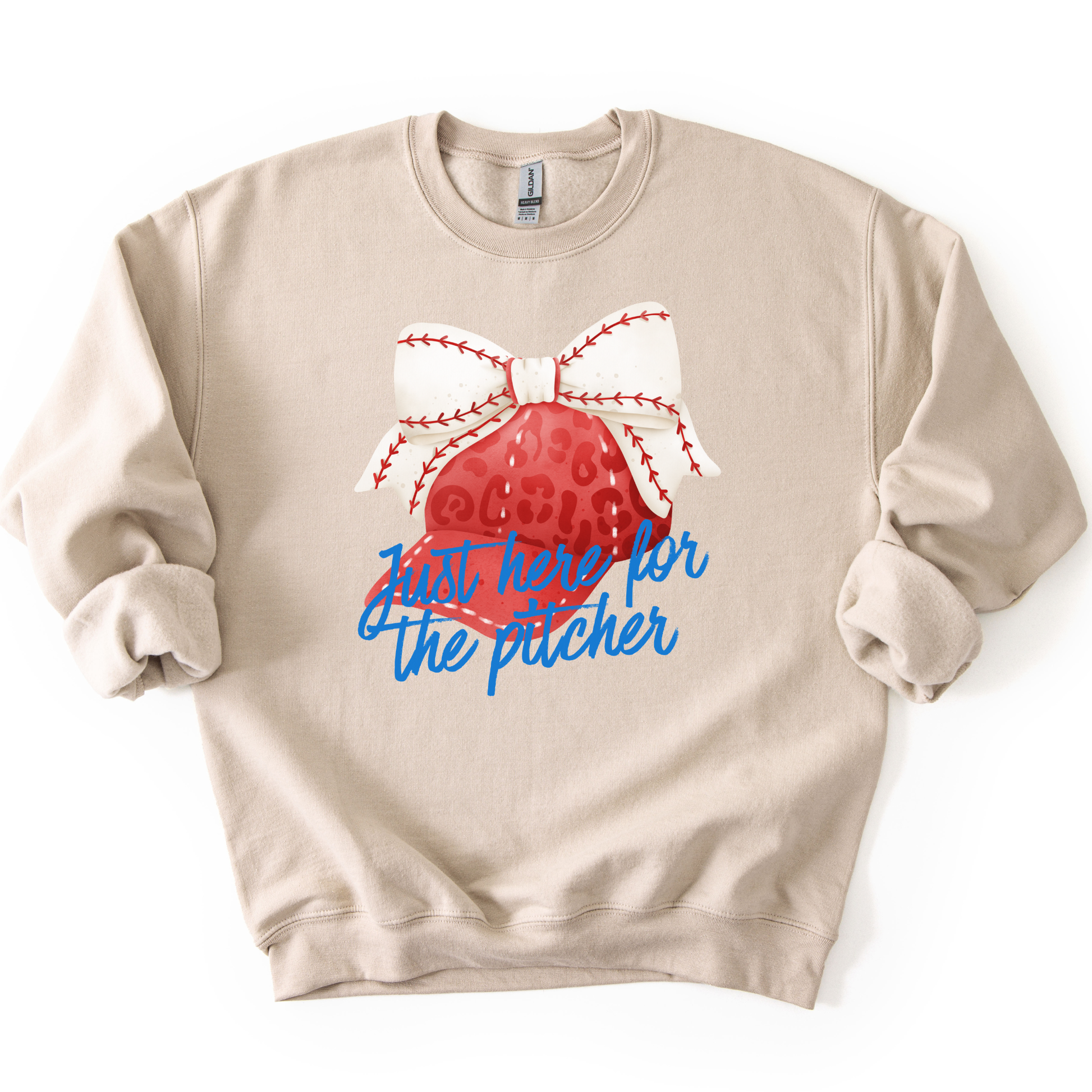 Beige sweatshirt with a red heart and white bow design on a white background