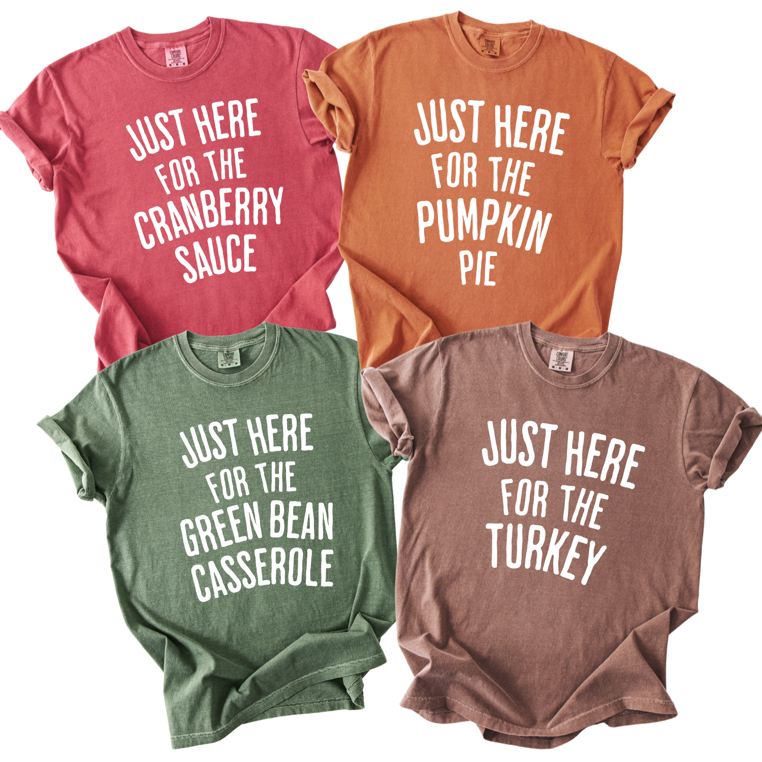 Funny Just Here For The Thanksgiving Dinner Graphic Tees.  Including Just here for the cranberry sauce on crimson red, Just here for the pumpkin pie on yam, Just here for the green bean casserole on moss green and Just here for the turkey on espresso brown Comfort Color tees.