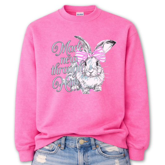 Pink Bold Christian graphic on a Gildan crewneck sweatshirt. The design features a fawn with soft brown detailing and a large pink bow, paired with the phrase “Wildly Loved” in blush vintage-style lettering. 