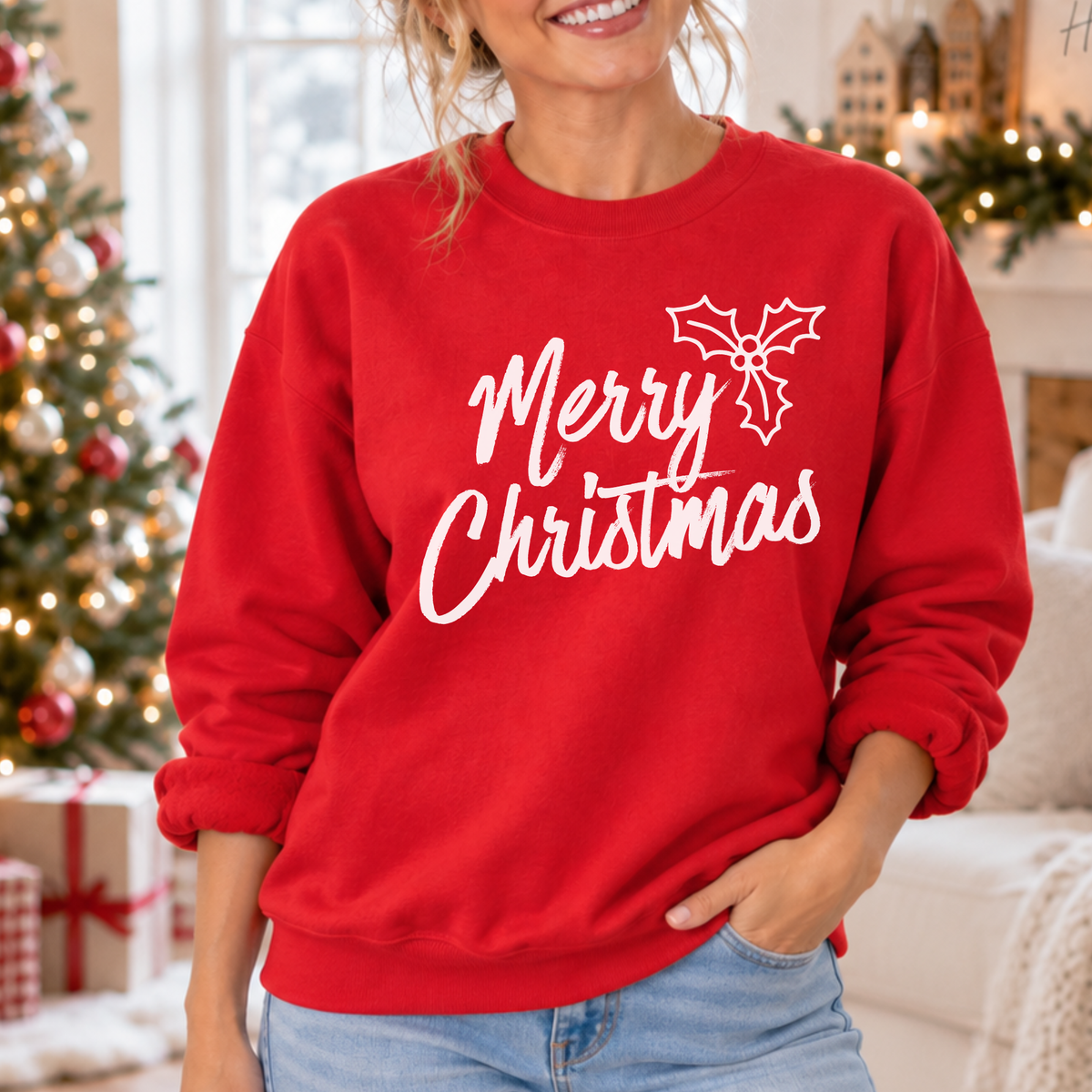 A classic Merry Christmas graphic with a simple holly detail for an easy, timeless holiday look on a red sweatshirt