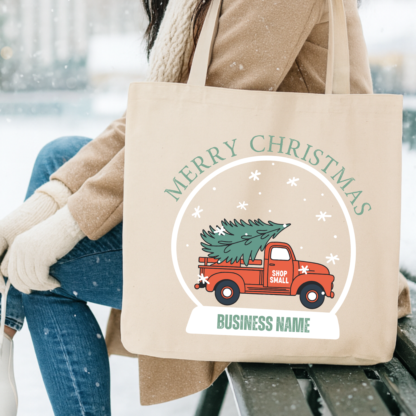 Canvas tote bag with a red truck carrying a Christmas tree in. snow globe.  Personalize it.
