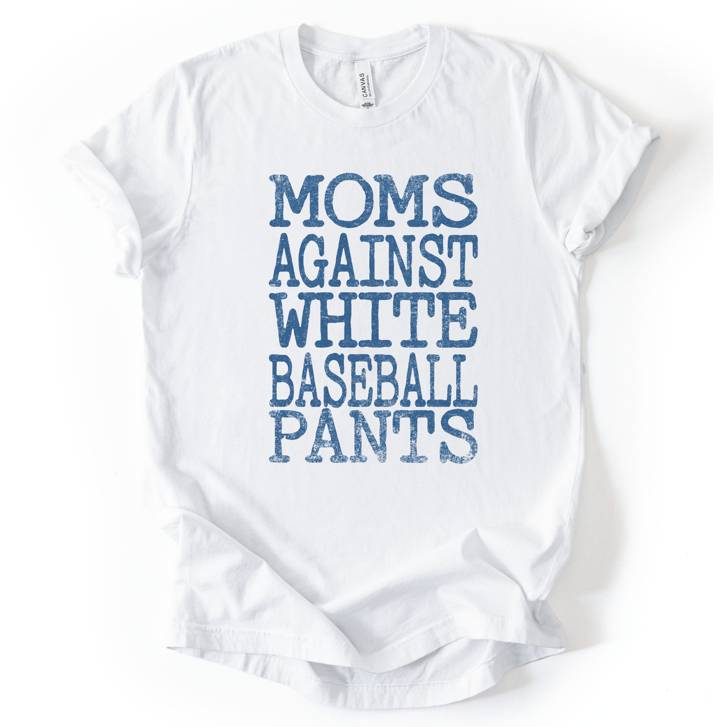 White t-shirt with blue text 'Moms Against White Baseball Pants' on a white background