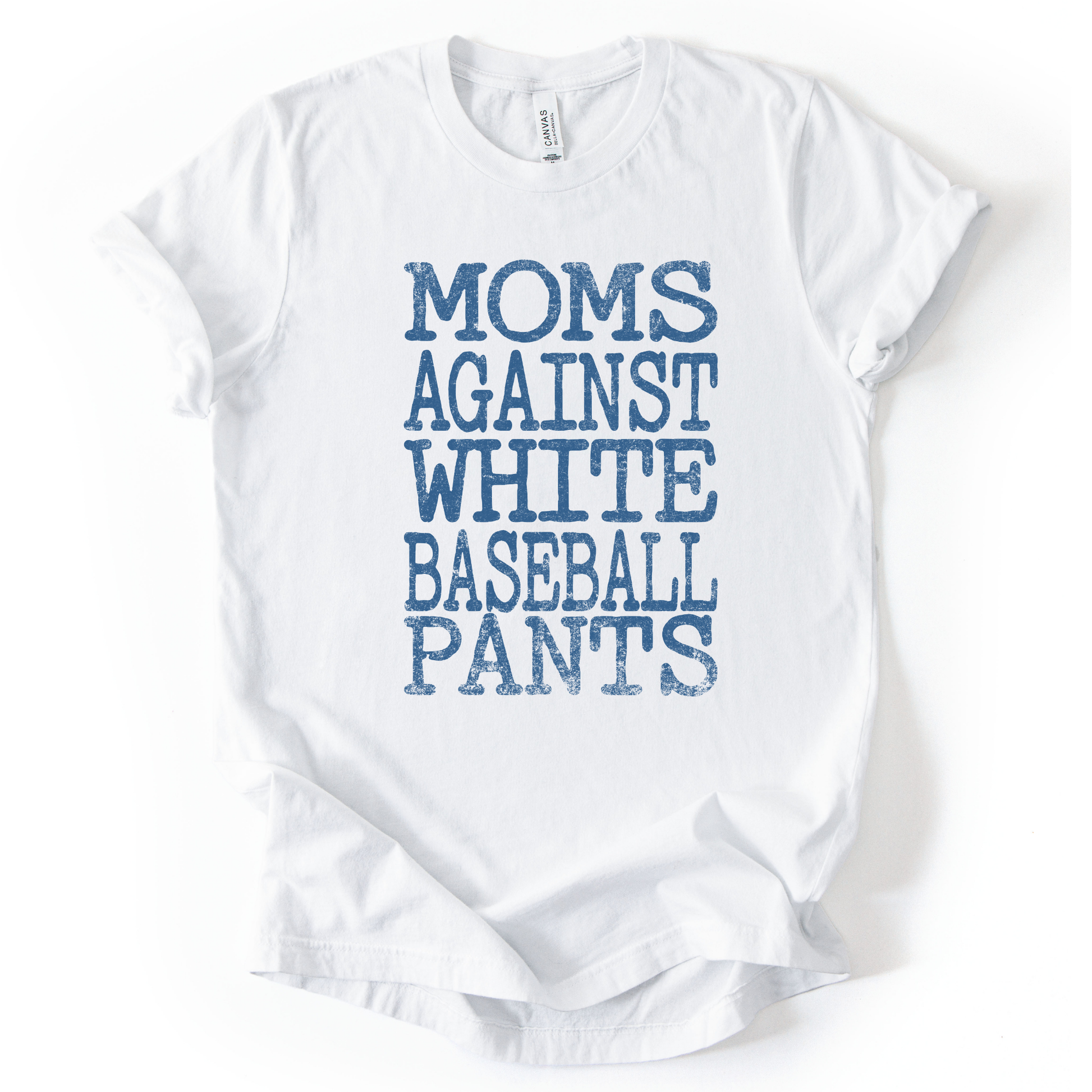 White t-shirt with blue text 'Moms Against White Baseball Pants' on a white background