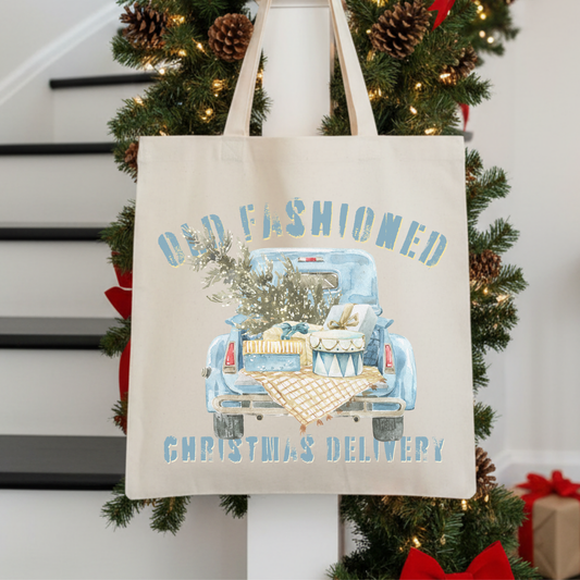 Tote bag with Christmas truck design that says Old fashioned Christmas Delivery